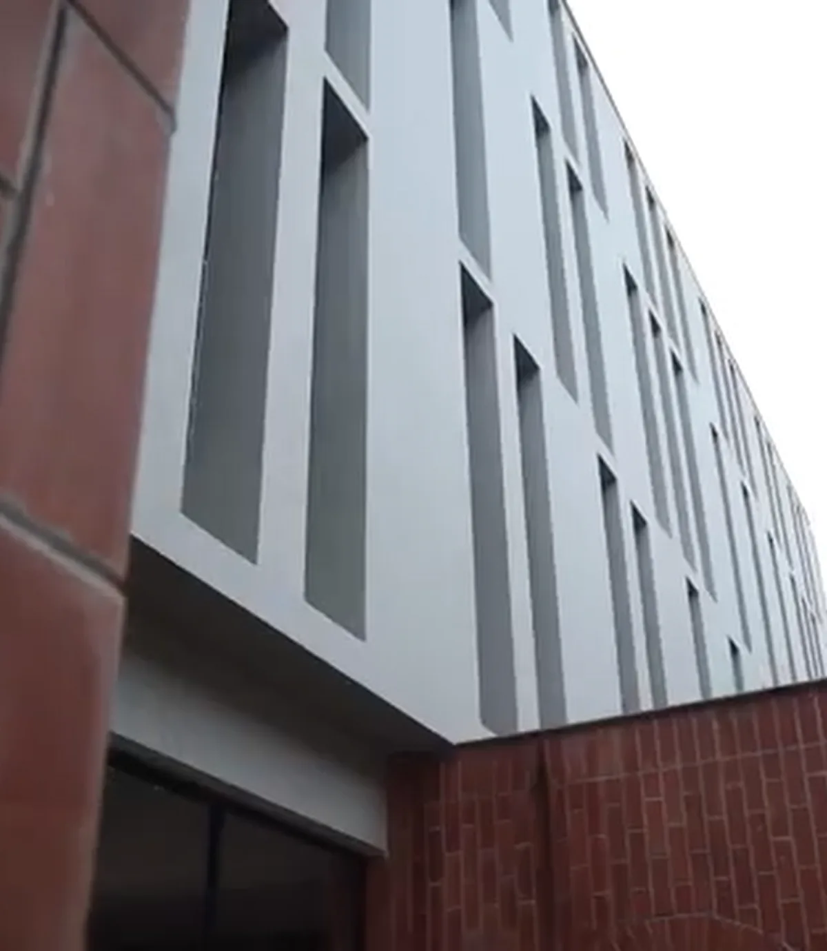 HGS institutional facade finished with Luxstone architectural texture